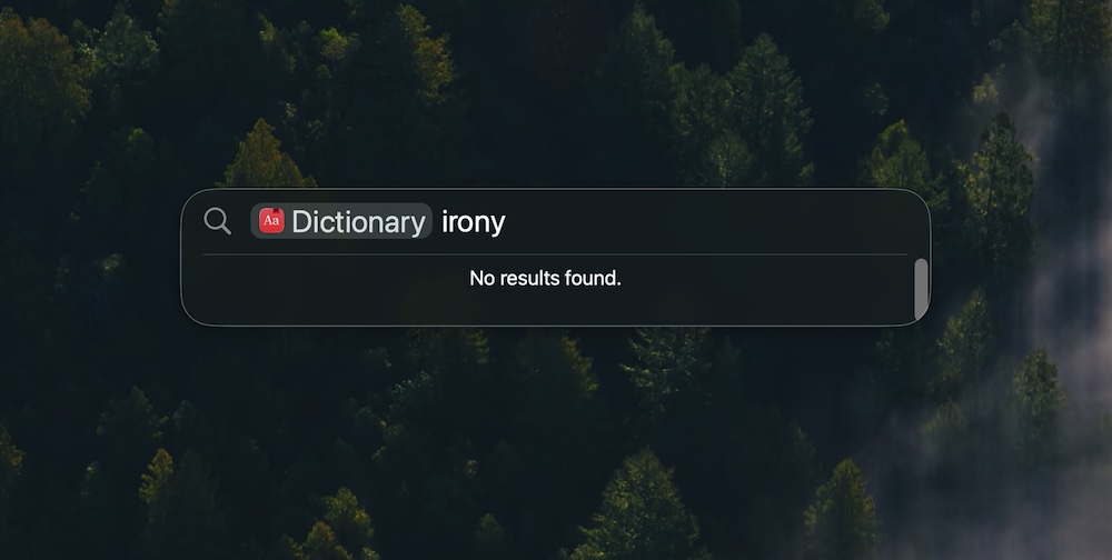 “Screenshot of macOS Tahoe Spotlight”